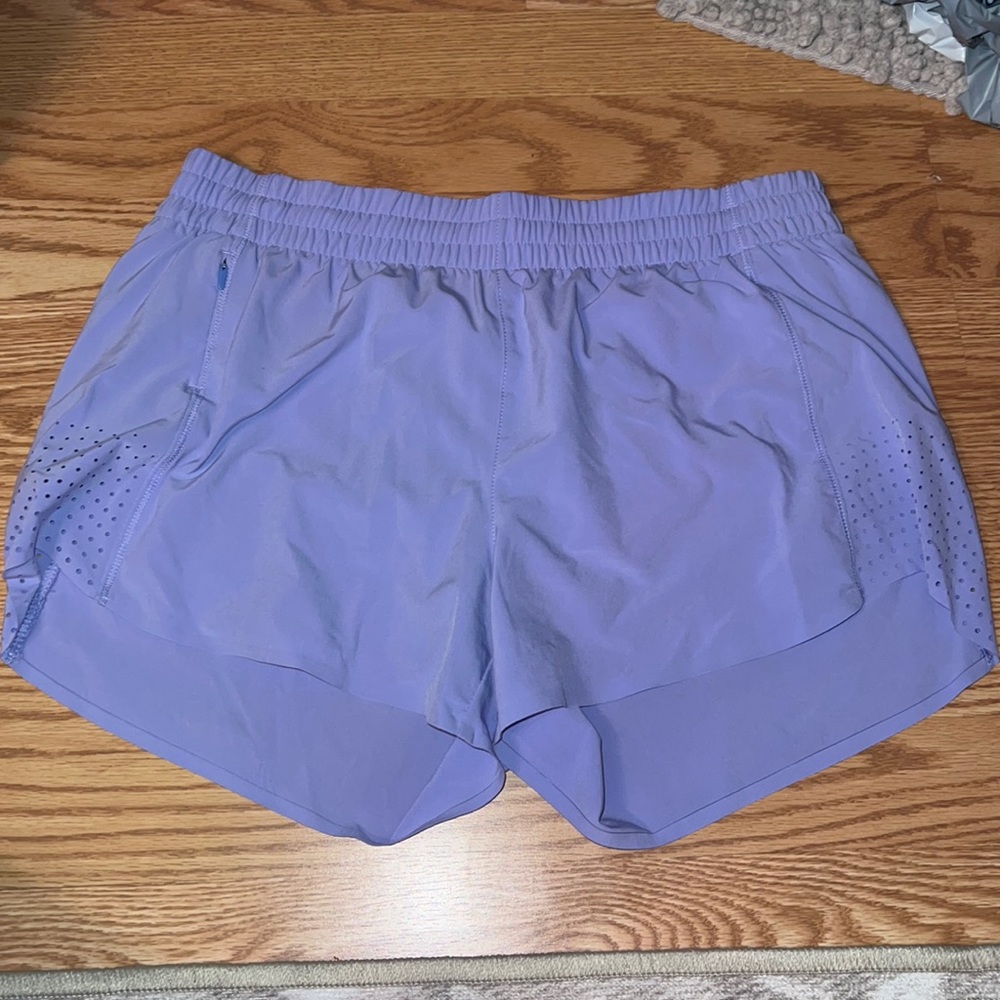 Periwinkle Athleta 3in. Hustle Short.